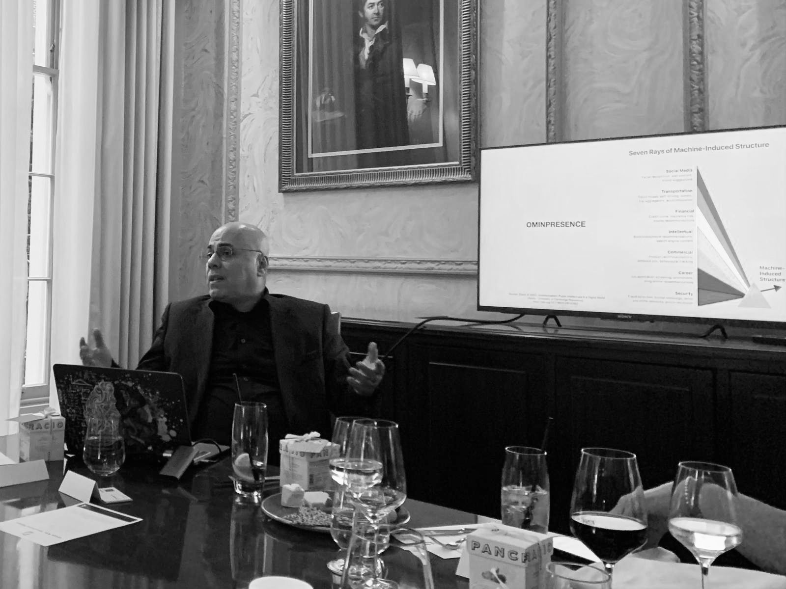ehab shanti talking in front of senior insurance executive about artificial intelligence
